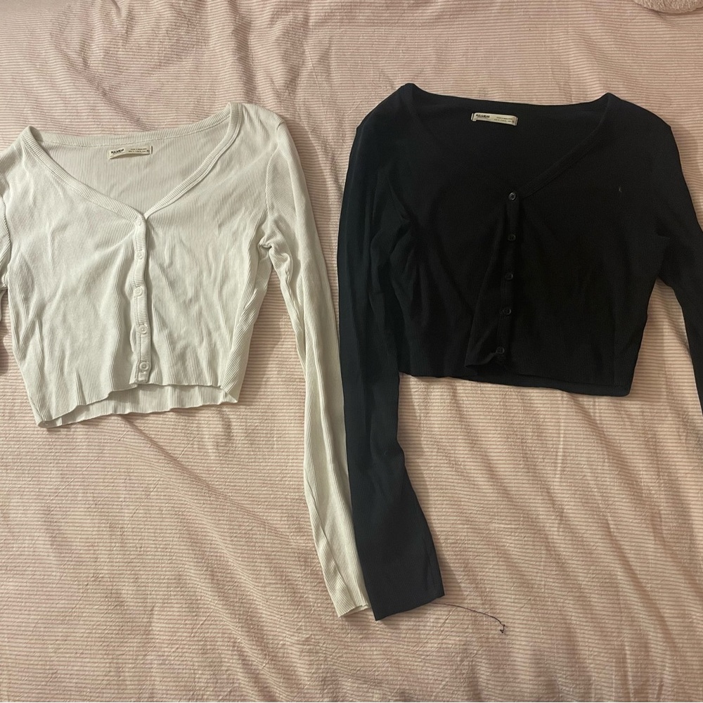 White and black cropped cardigans